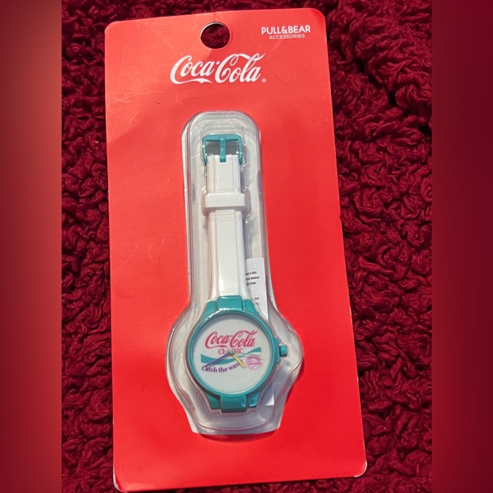 Coca-Cola Plastic Watch with ( Catch the Wave Logo)